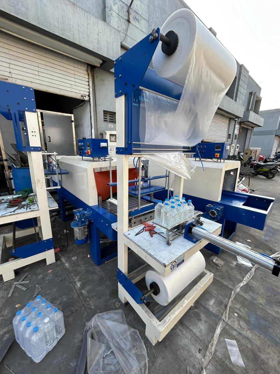 Semi Automatic Shrink Wrapping Machine - Mild Steel, Compact Size, White And Blue Color | Durable, Efficient, User-friendly Design For Versatile Industry Applications