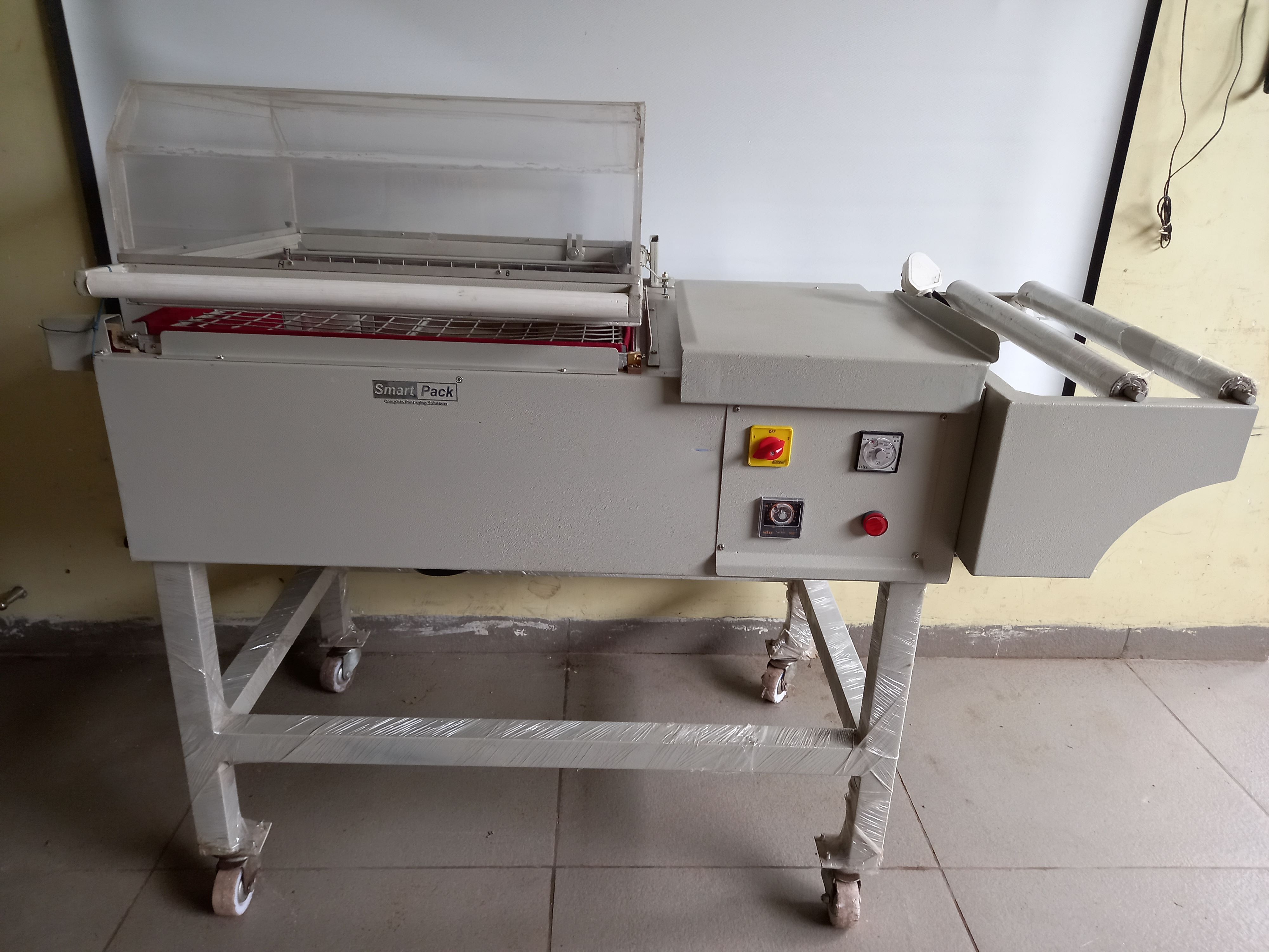 Shrink Wrapping Machine - Ms Material, 1560x700x1100 Mm Size, Gray Color | Semi-automatic Type, Electric Drive, 30-50 Capacity