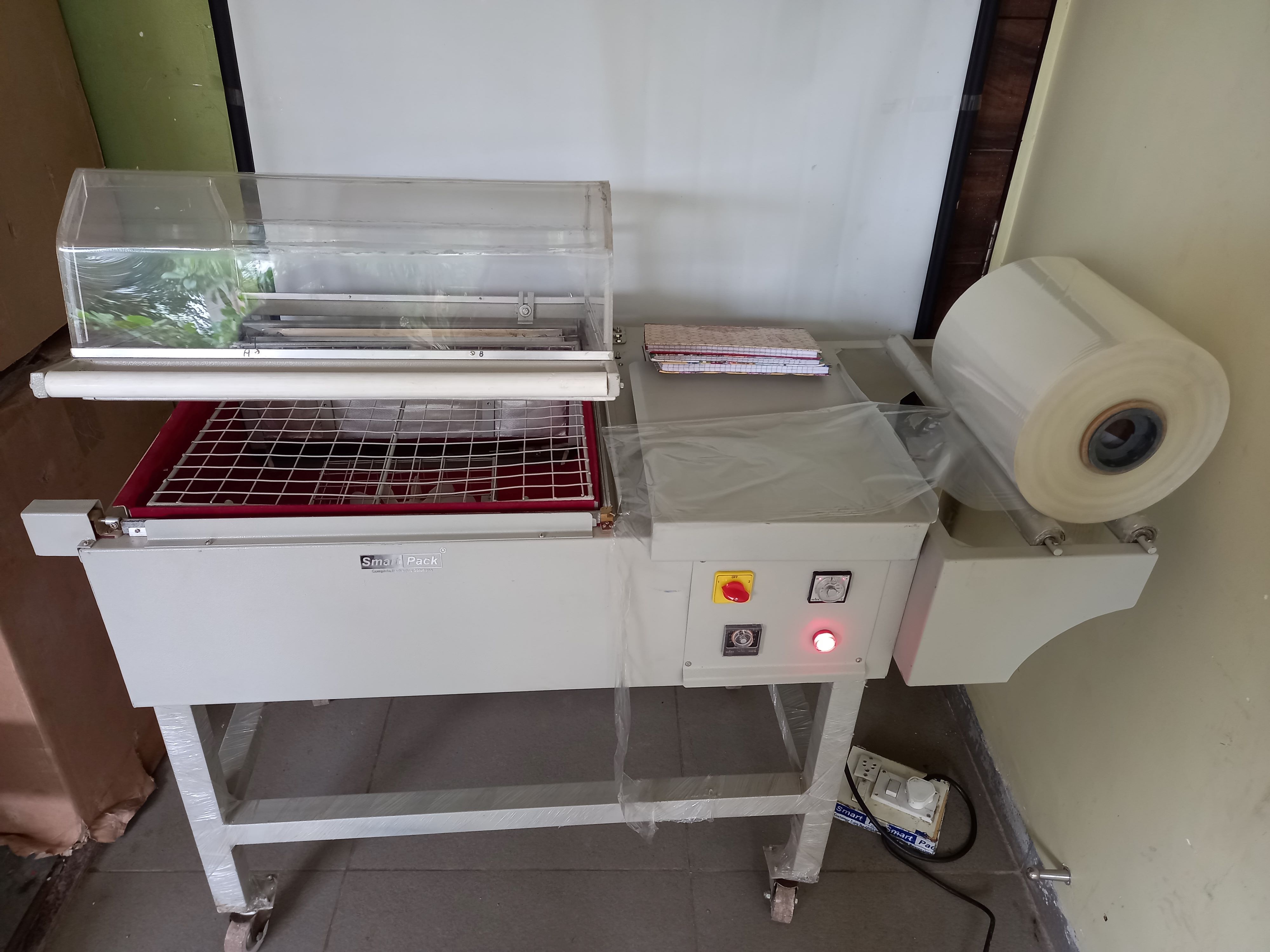 Shrink Wrapping Machine - Ms Material, 1560x700x1100 Mm Size, Gray Color | Semi-automatic Type, Electric Drive, 30-50 Capacity