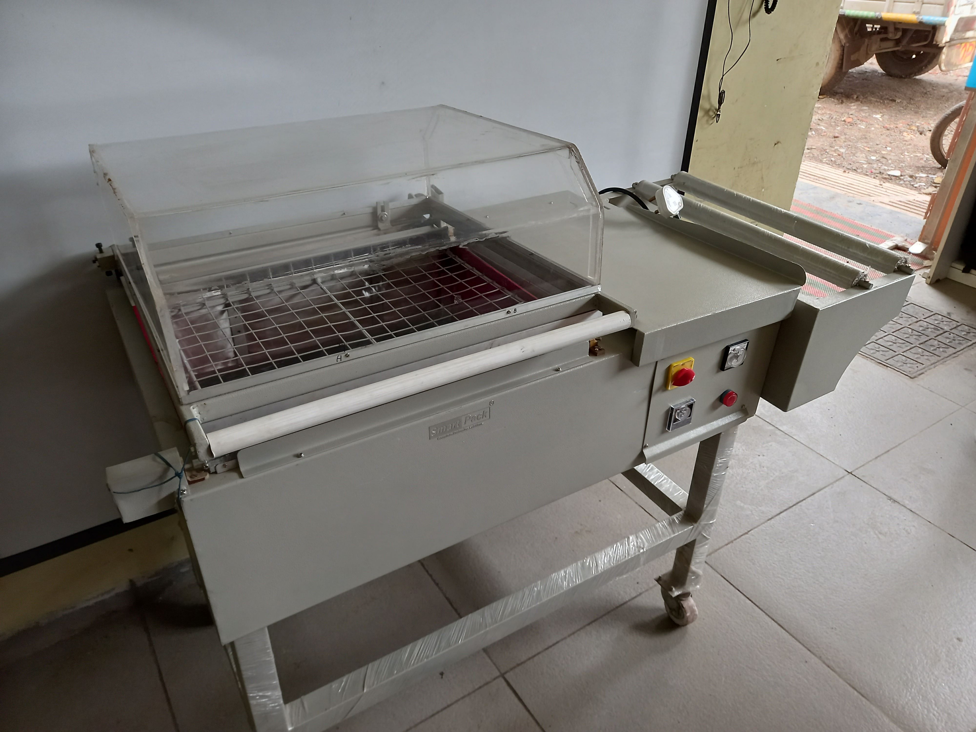 Shrink Wrapping Machine - Ms Material, 1560x700x1100 Mm Size, Gray Color | Semi-automatic Type, Electric Drive, 30-50 Capacity
