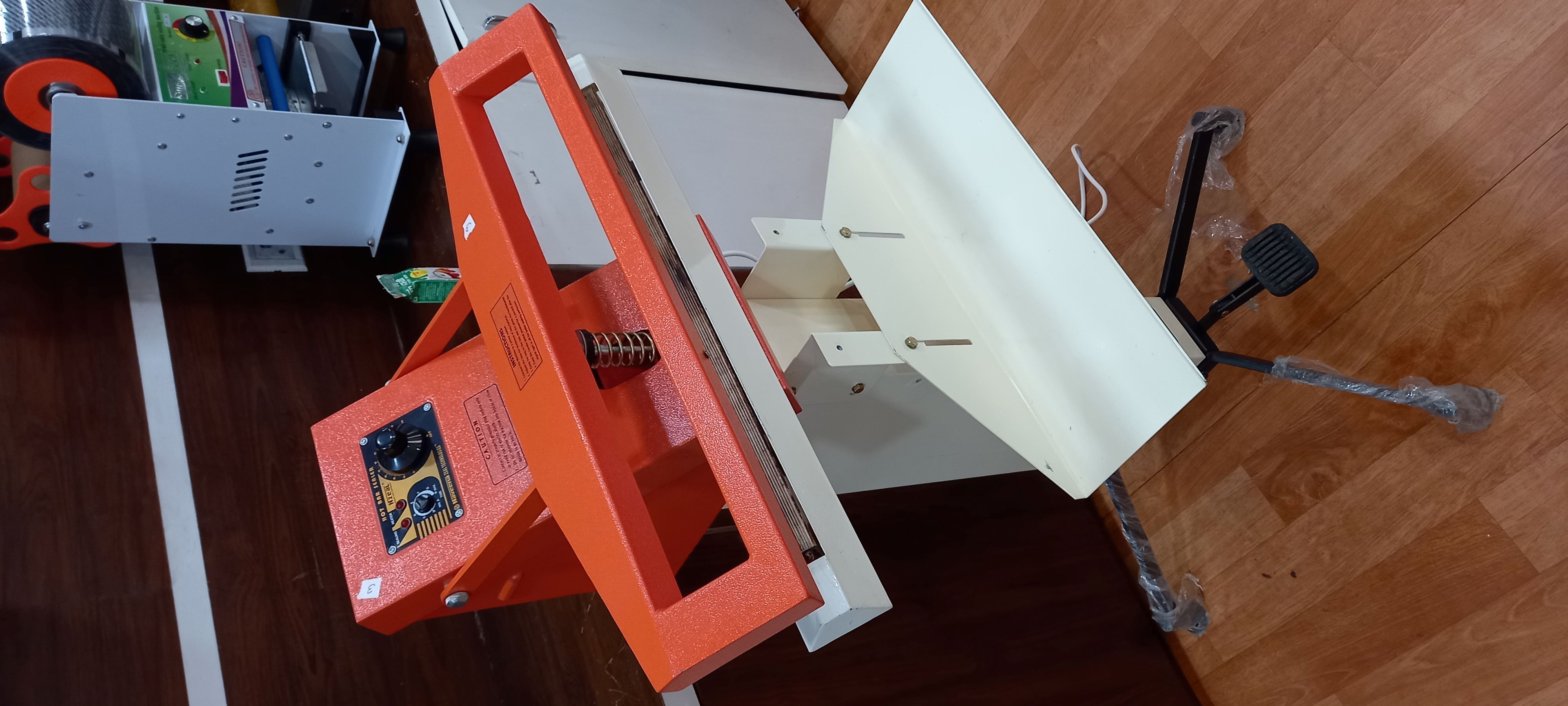 Foot Operated Heat Sealer Machine - Electric, 1370x920x1800 Mm, Orange | Ideal For Multi Layer Laminated Bags, Hot Bar Sealing Capability, Manual Operation