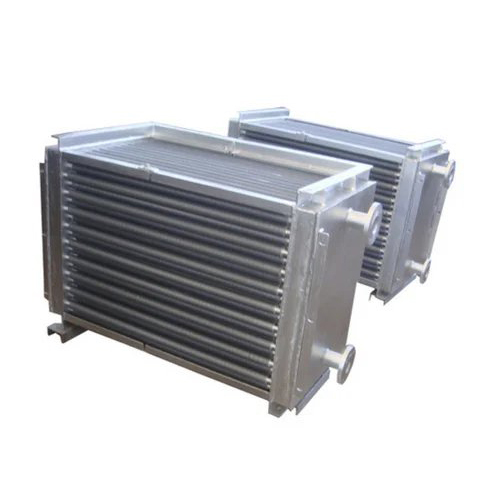 Textile Dryers Heat Exchanger - Mild Steel With Round & Elliptical Finned Tubes, 10000 Kcl To 60000 Kcl Capacity, White Color, 380 Volt Voltage, 1 Year Warranty