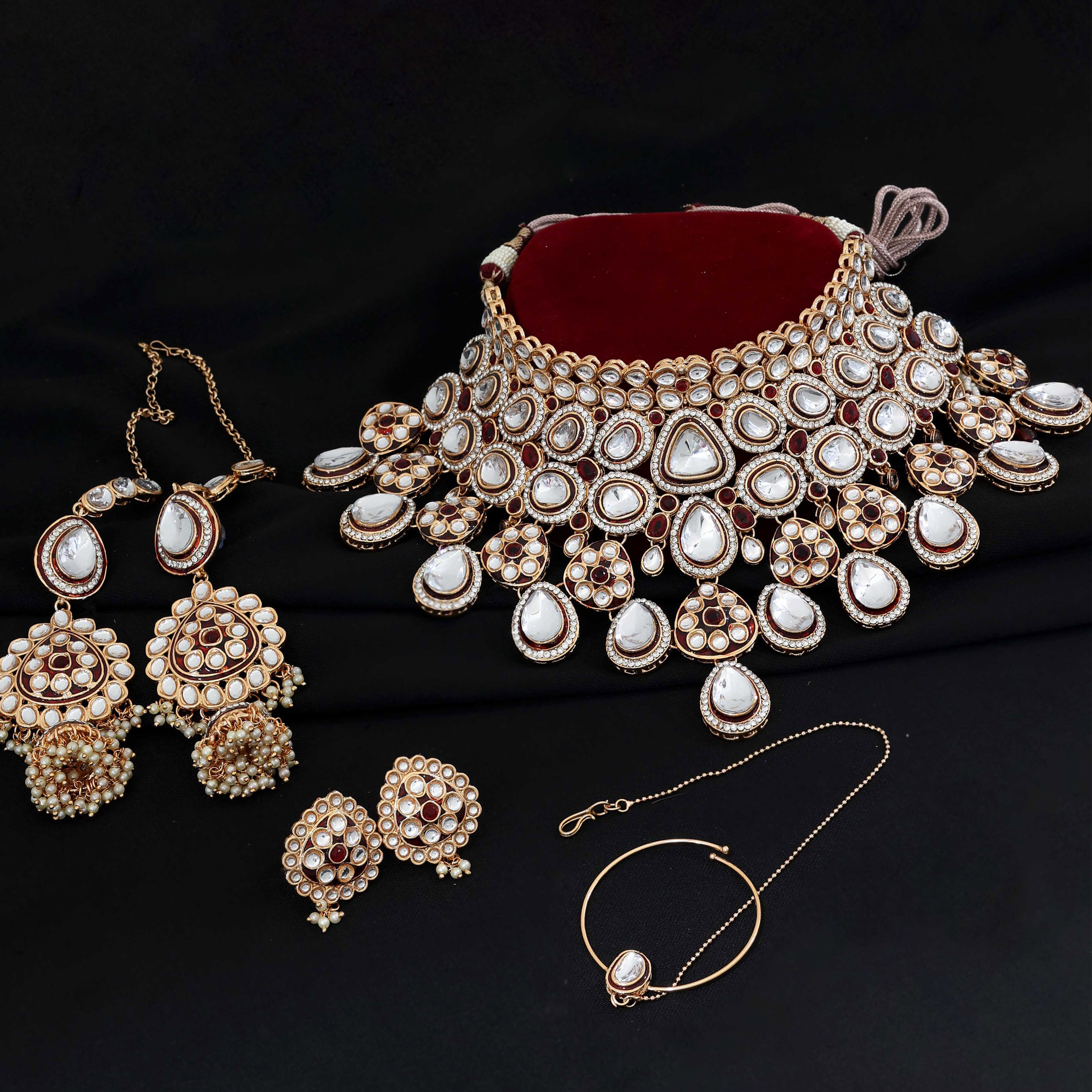 Dazzling Divinity Kundan Semi Bridal Rose Gold Plated Jewellery Set..