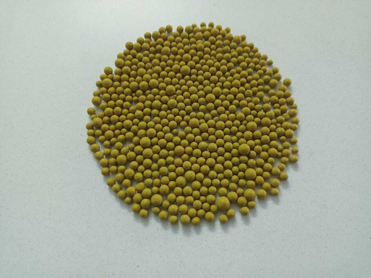 Round Bentonite Granules Of Six Different Colors For Cat Litter Purpose And Industrial Purpose