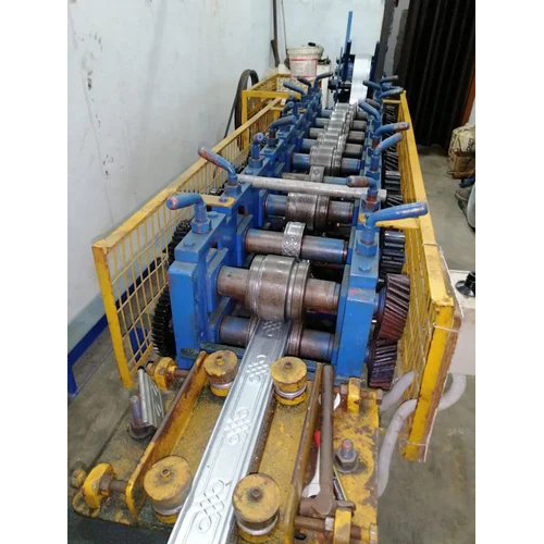 Roller Shutter Door Roll Forming Machine - Mild Steel Construction, 220-440 Voltage, Automatic Grade, 1 Year Warranty, Blue & Yellow Finish