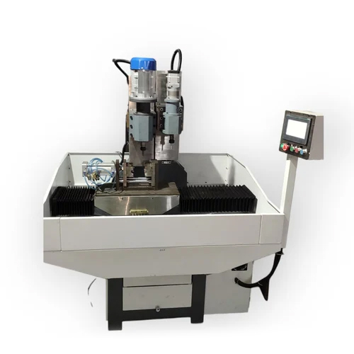 ऑटो फ्लैन्ज ड्रिलिंग और टैपिंग मशीन