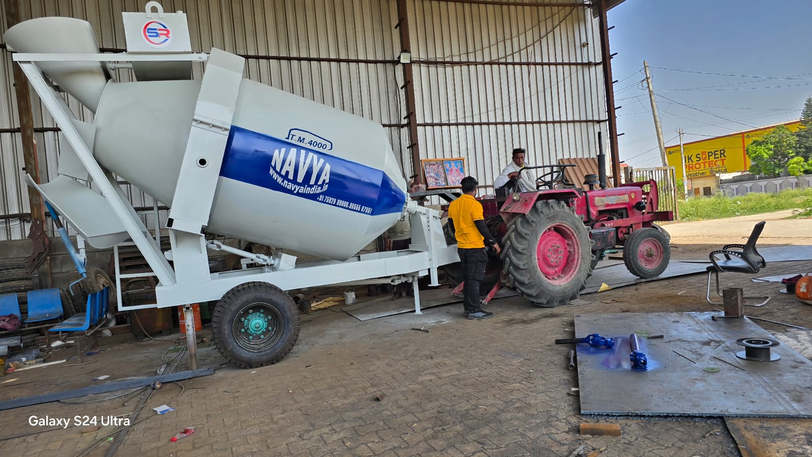 White Tractor Operated Mixer