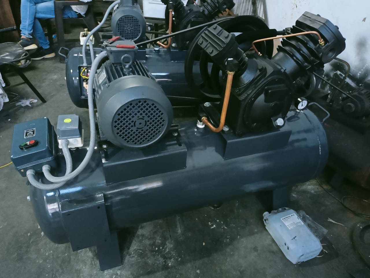Reciprocating Air Compressor - MS Material, 220 Volt , Sleek Black Color , Oil-Less Lubrication System , Low Maintenance Design , Compact & Efficient for Industrial Use